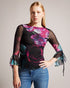 CATYELA-Tops-CATYELA seamlessly blends femininity with edge. The slashed straight neckline creates a bold stylish statement, while the 3/4 sleeves with fluted cuff add a delicate and romantic touch. The ruched seam through the sleeves adds texture and dimension, elevating the overall look. Brilliantly versatile, this top looks great with anything from boyfriend jeans to a leather skirt. Mesh top Slim fit Floral print Slashed straight neckline 3/4 sleeves with fluted cuff Ruched seam through sleeves- Ted Bak